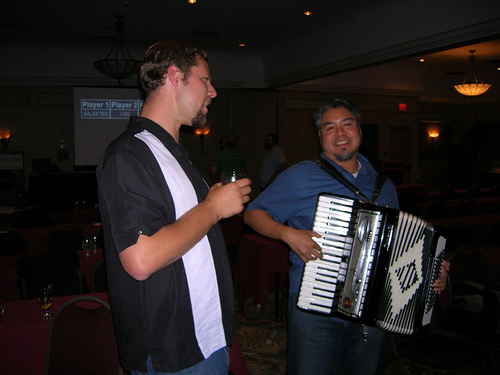 Accordion Guy playing at php|works
