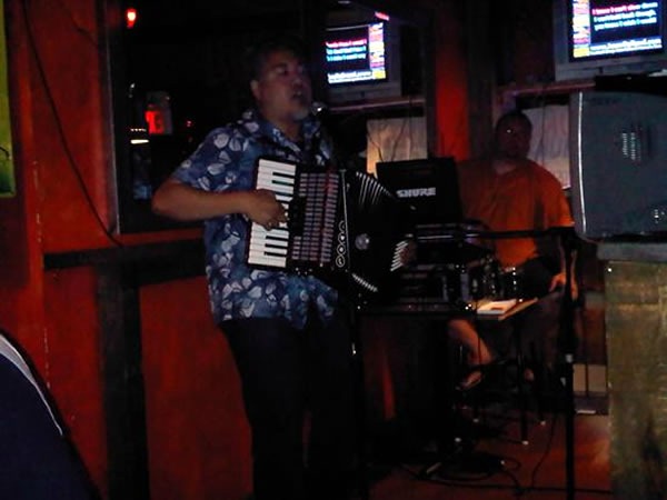 Joey deVilla playing "Ain't No Rest for the Wicked" on accordion at