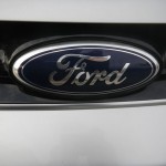"Ford" logo plate on the front grill