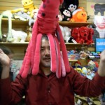 Joey deVilla poses with a plush squid on his head