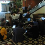 The hackers at the 2002 O'Reilly Emerging Technology Conference taking over the conference hotel lobby.