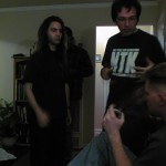 Bram Cohen, Danny O'Brien and Kevin Burton are deep in discussion.