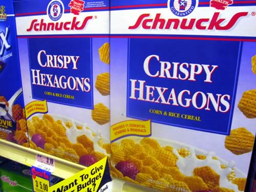 Cereal boxes labelled 'Crispy Hexagons'.