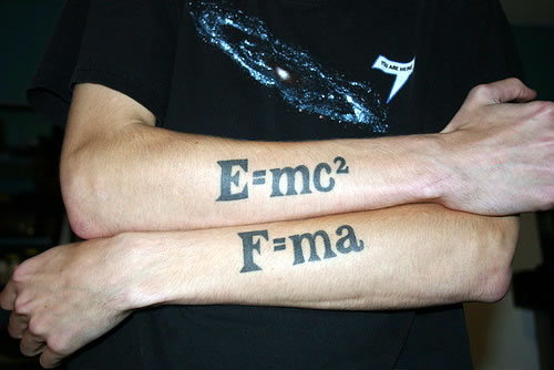 Forearm tattoos: E=mc squared and F = ma.