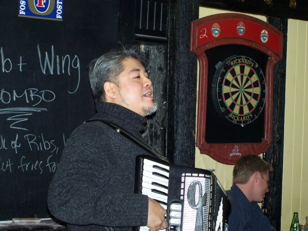 Joey deVilla playing accordion at Hector Catre’s birthday at the Rose and Crown, Yonge and Eglinton, Toronto.