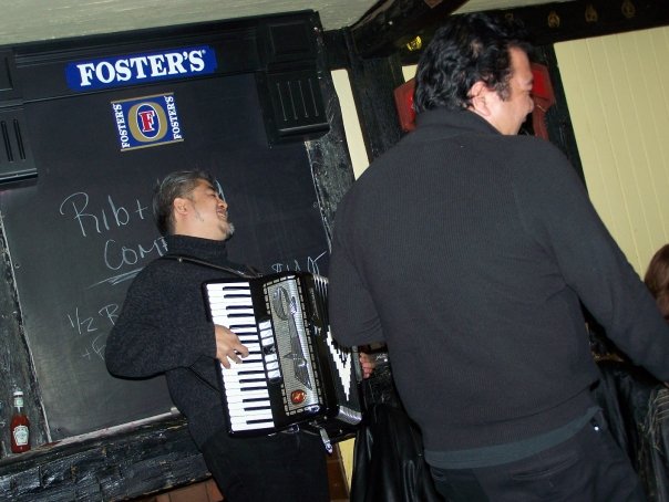 Joey deVilla playing accordion at Hector Catre’s birthday at the Rose and Crown, Yonge and Eglinton, Toronto.