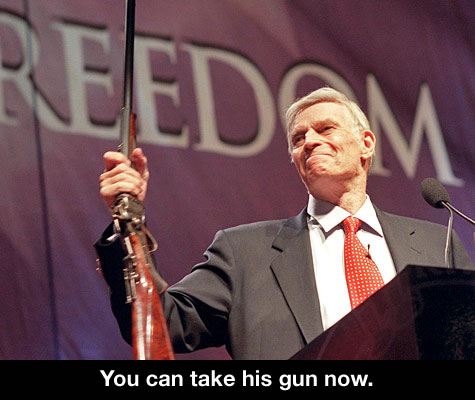 Charlton Heston holding a rifle: “You can take his gun now.”