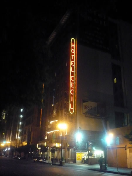 4. Exterior shot of the Hotel Ceicl at night, showing its neon sign aglow