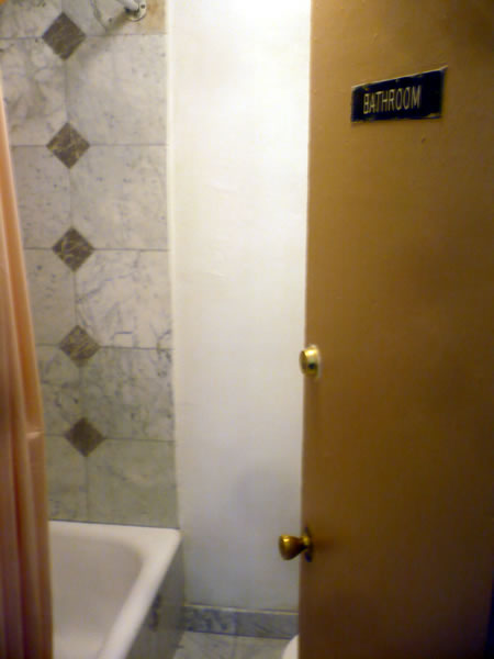 16. Hall bathroom at Hotel Cecil