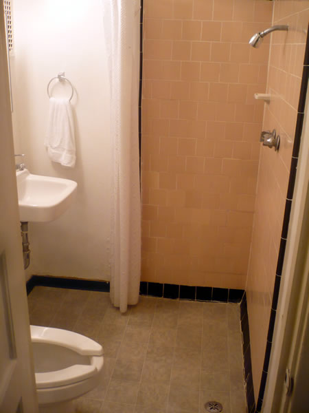 21. Hotel Cecil in-room bathroom, showing more of the shower