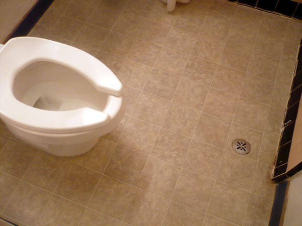 22. Toilet and floor drain in my in-room bathroom at Hotel Cecil