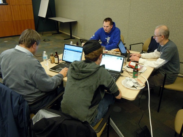 Nik Garkusha and three other developers, working on their open data solution