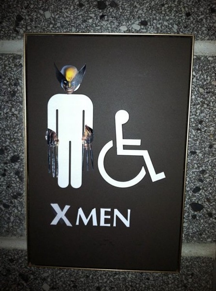 Men's room sign with standing man figure and wheelchair figure altered so that the standing man has Wolverine's head and claws. A letter 'X' was placed before 'MEN'. The wheelchair figure makes a natural Professor Charles Xavier.