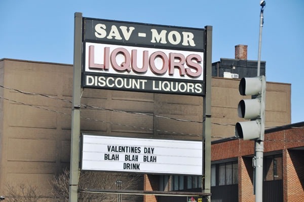 Liquor store sign that reads: "Valentine's Day / Blah blah blah / Drink"