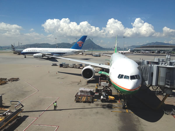 Hong Kong airport tarmac - EVA Air jet in foreground, China Airways A380 in background