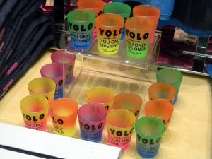 Set of coloured shot glasses labelled "YOLO: You Only Live Once"