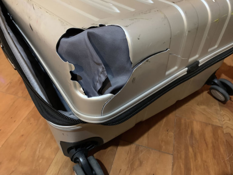 suitcase hole The Adventures of Accordion Guy in the 21st Century