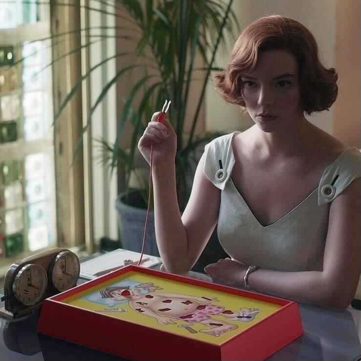 Photo: “Beth” from “The Queen’s Gambit” playing Operation instead of chess.
