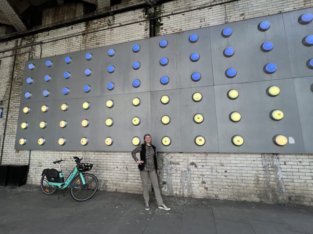 Anitra Pavka poses with against the wall of the Southwark Street tunnel in London’s Southbank.