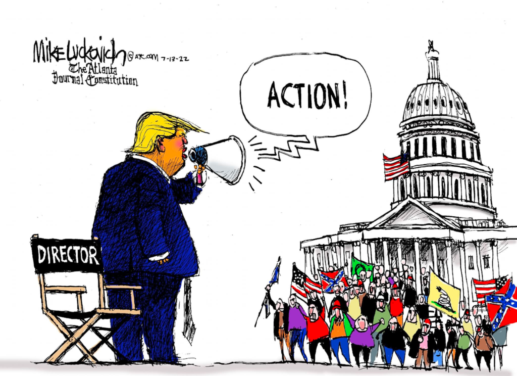 Editorial cartoon by Mike Luckovich featuring the January 6th crowd gathered in front of the U.S. Capitol Building and Donald Trump in a director’s chair yelling “Action!”