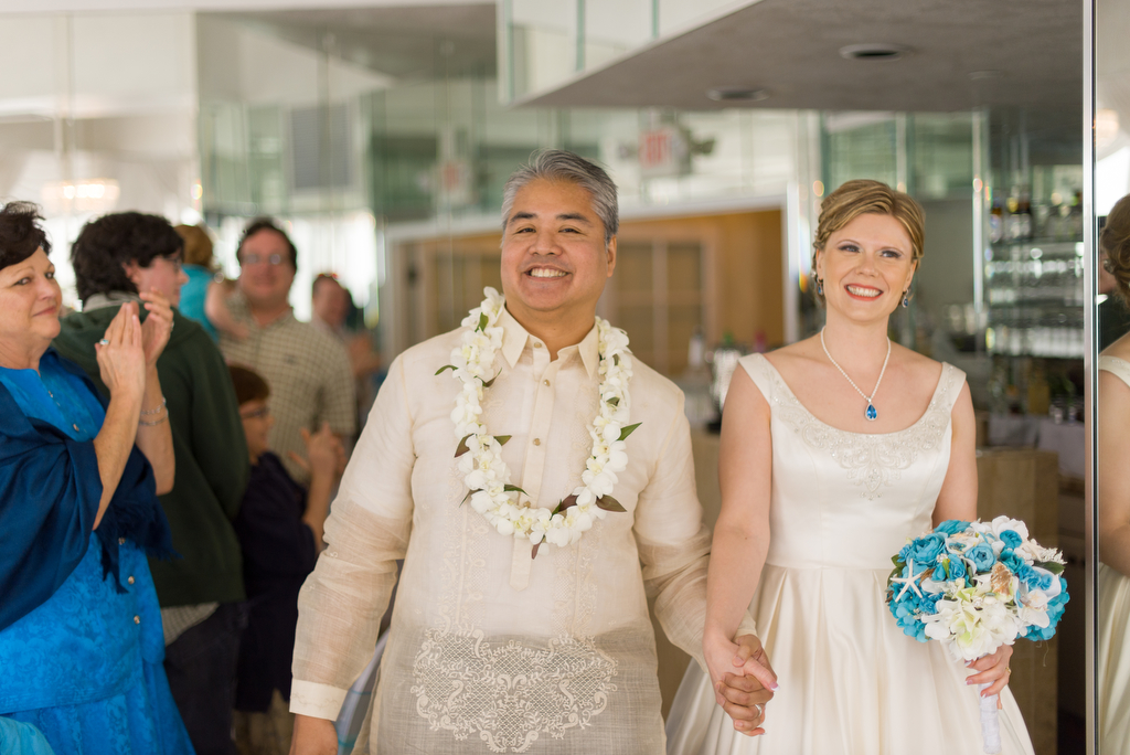 Anitra Pavka and Joey deVilla wedding photo: Walking into the reception as a married couple.
