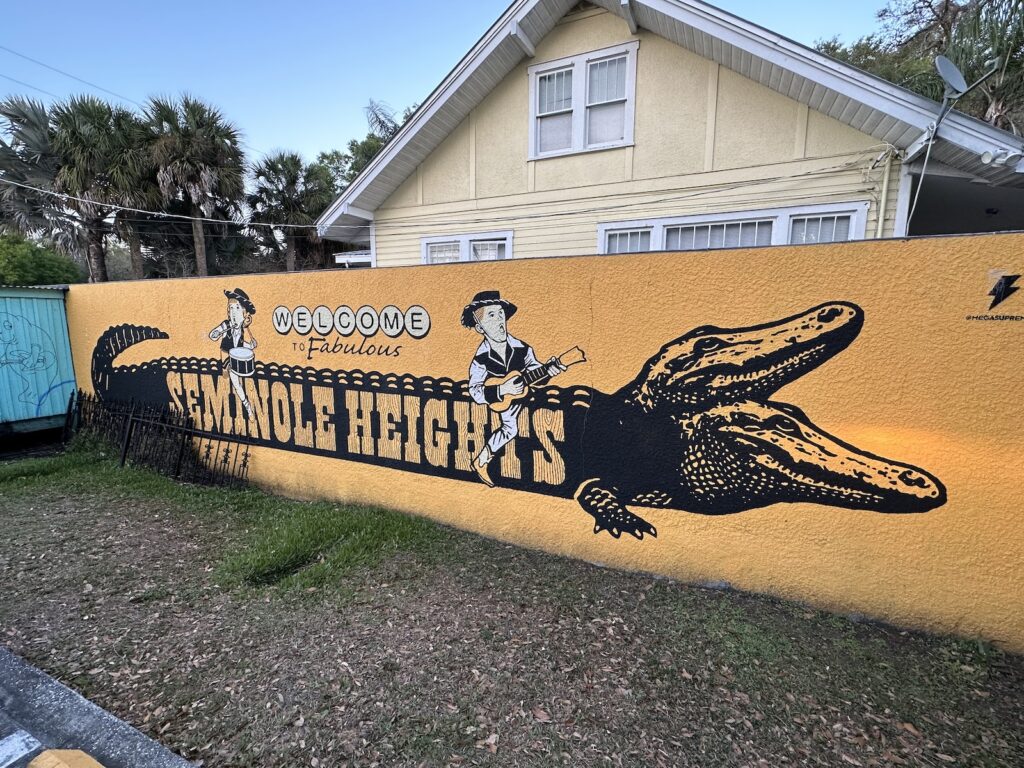 A “Welcome to Fabulous Seminole Heights” mural, featuring the two-headed alligator named “Bite or Smite.”
